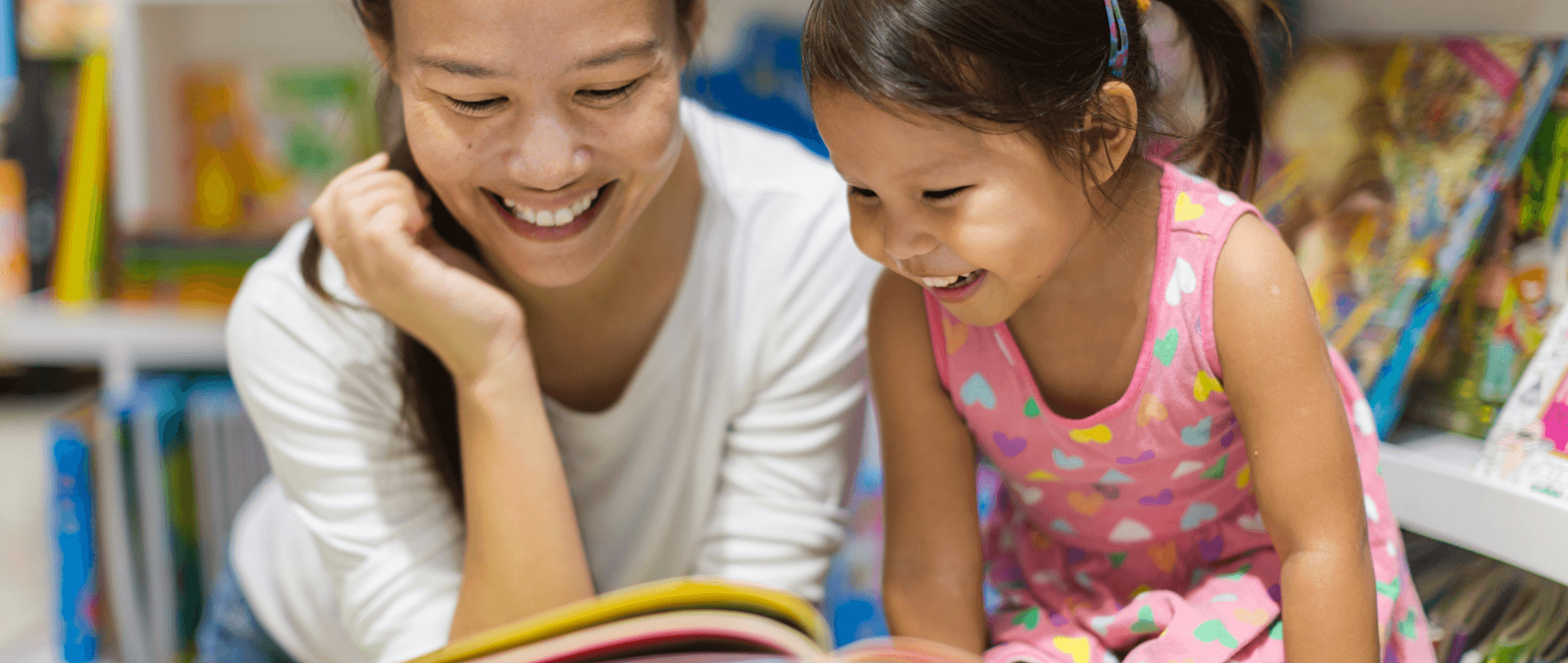 Woman reading with child