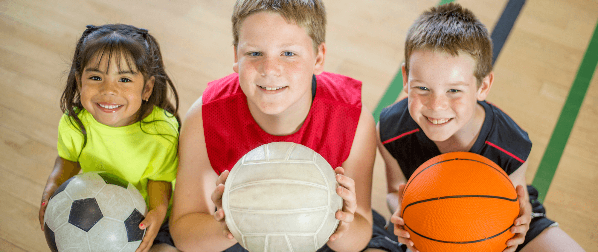 Children with various sport balls