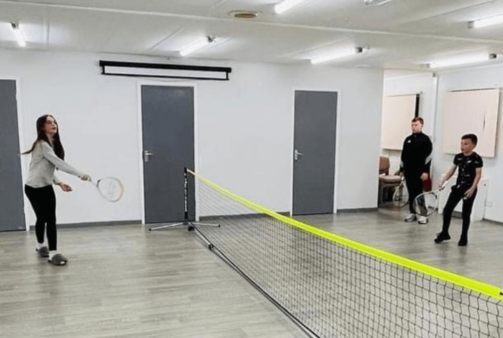 Children playing badminton