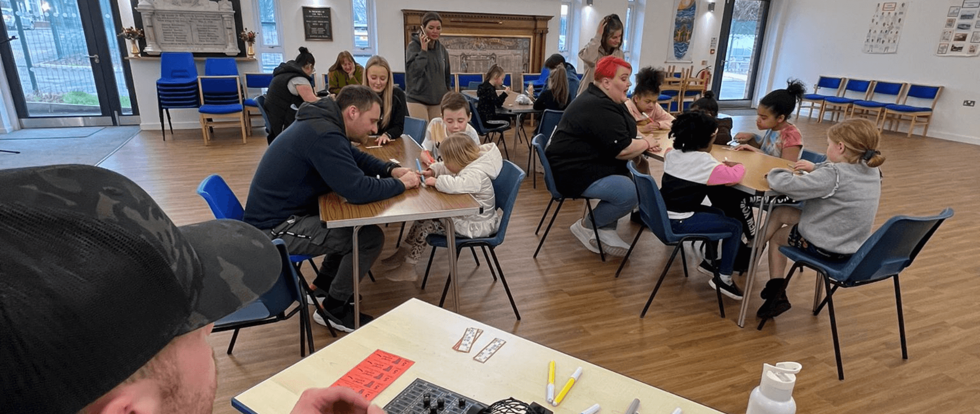 Children doing crafts at tables