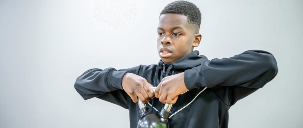 Young boy working out