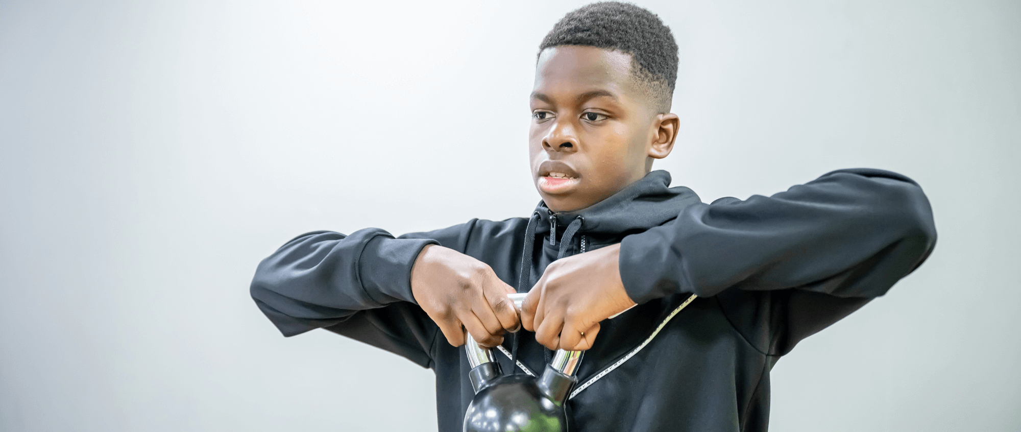 Young boy working out
