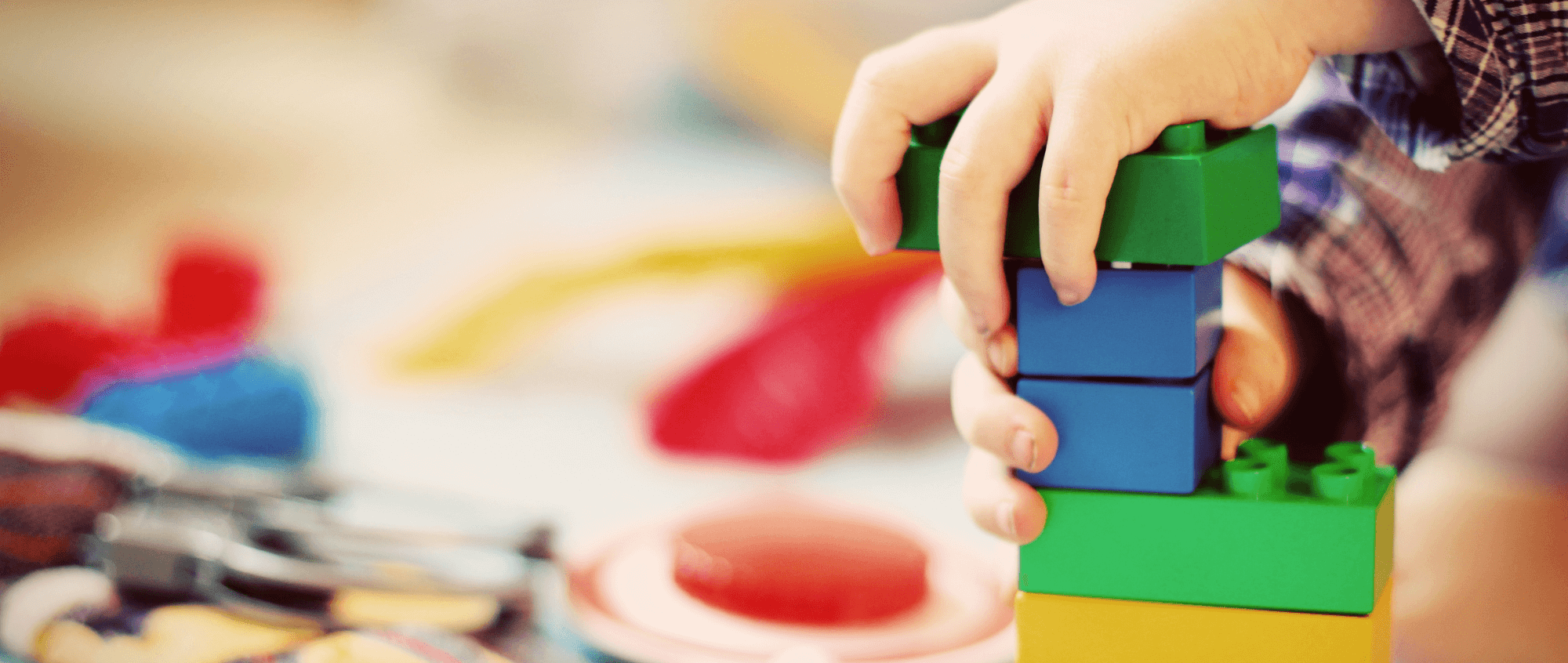 Child building bricks