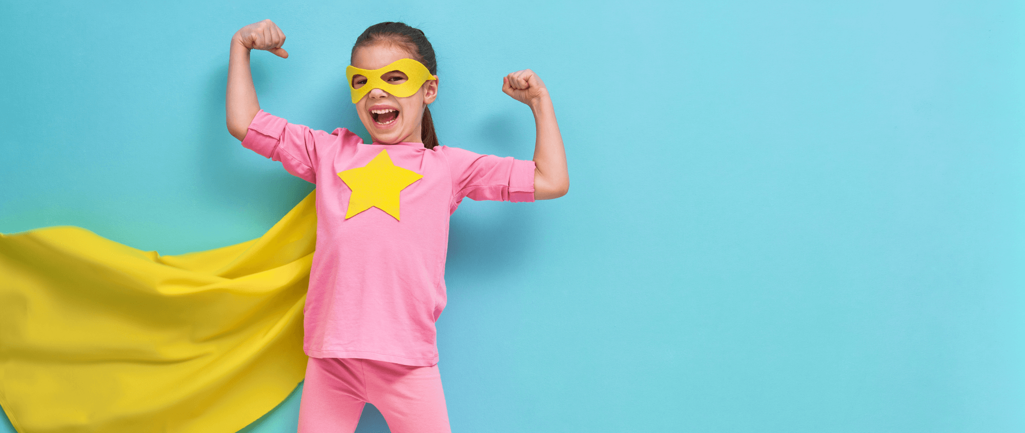 Child in cloak and mask