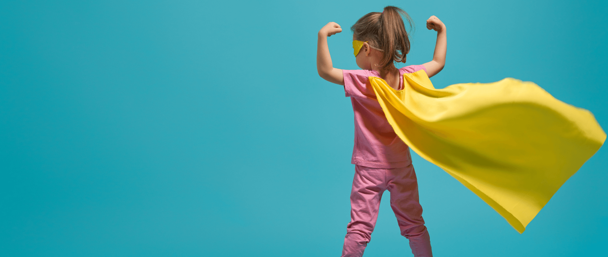 Child in superhero cape