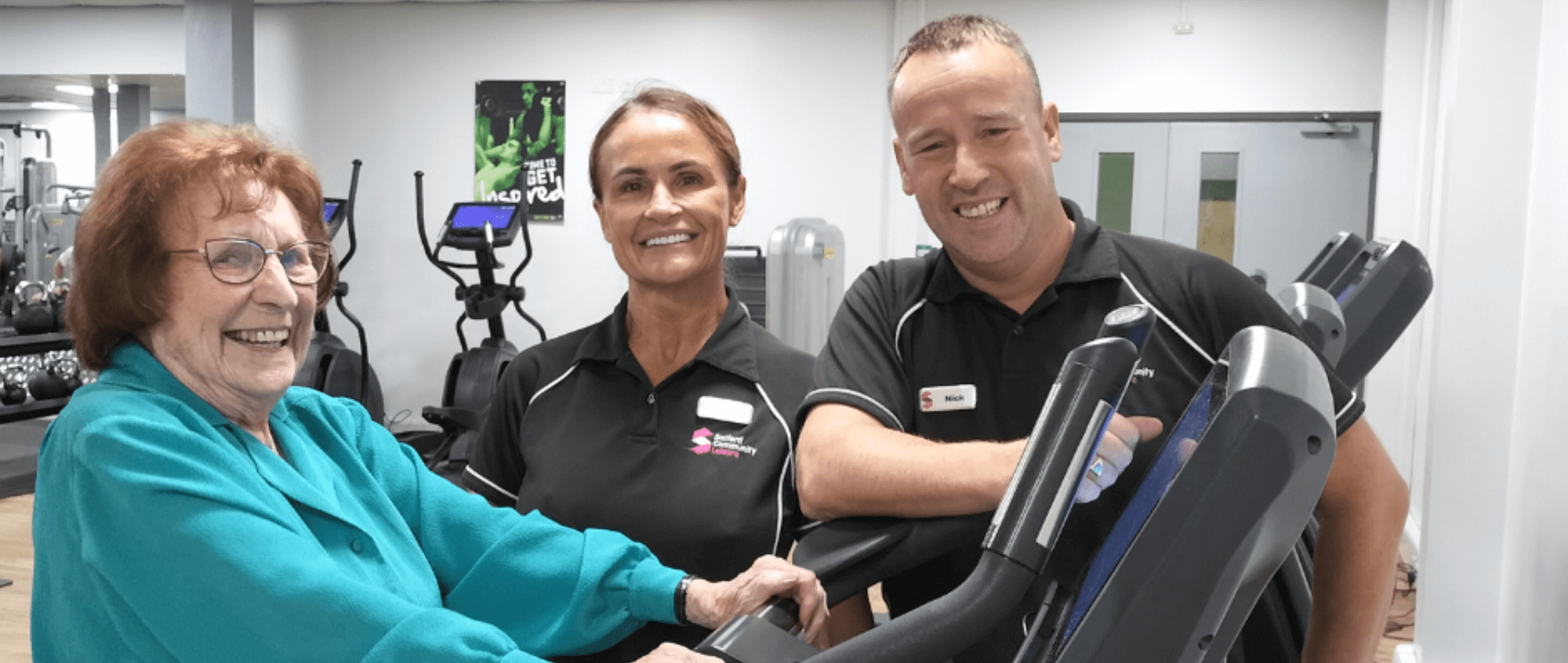 Member with leisure centre staff