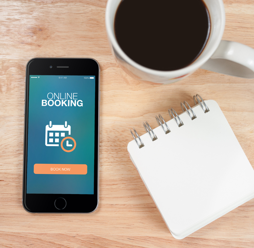 Phone with a notepad and cup of coffee