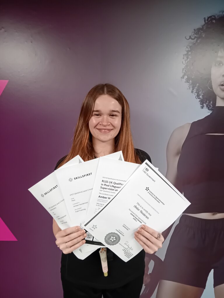 Photo of girl holding certificates