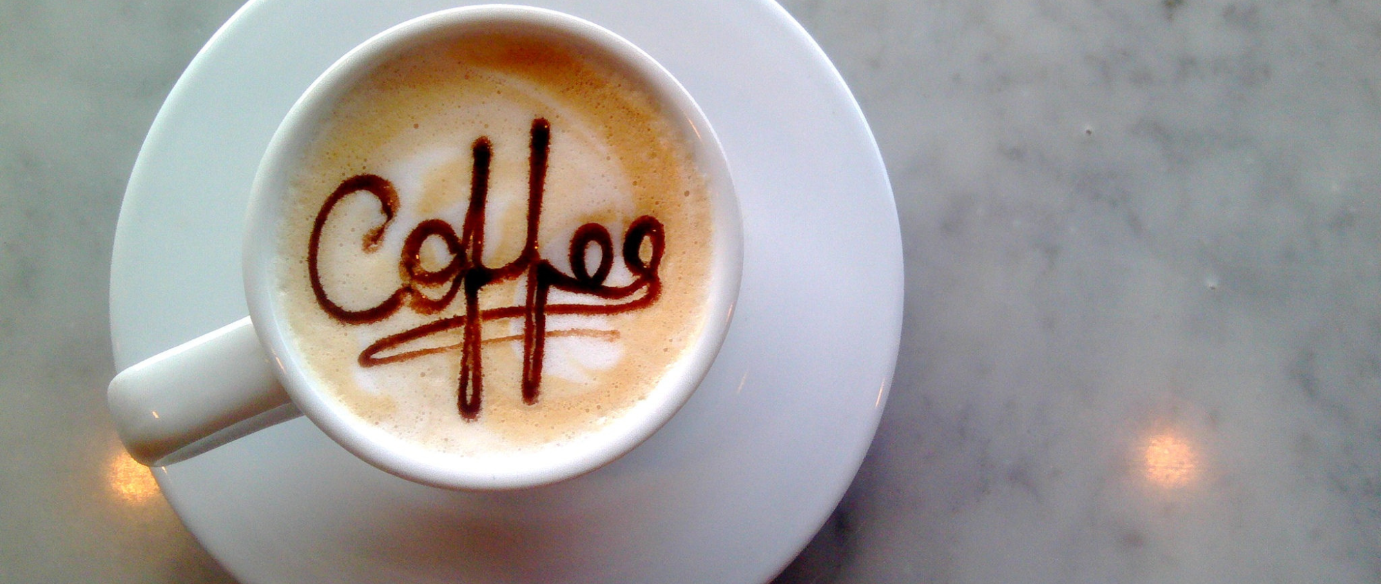 Cup of coffee with the word coffee