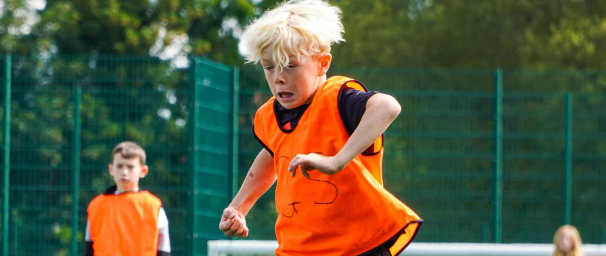 Boy playing football