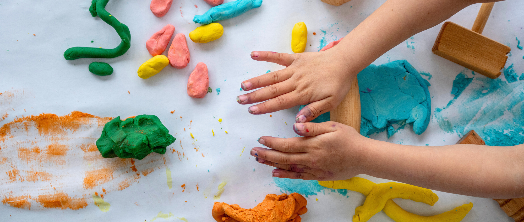 Child playing with clay
