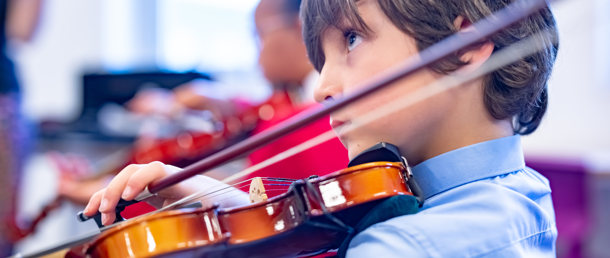 Child playing a violin