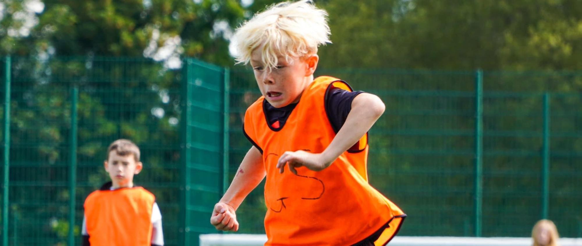 Boys playing football