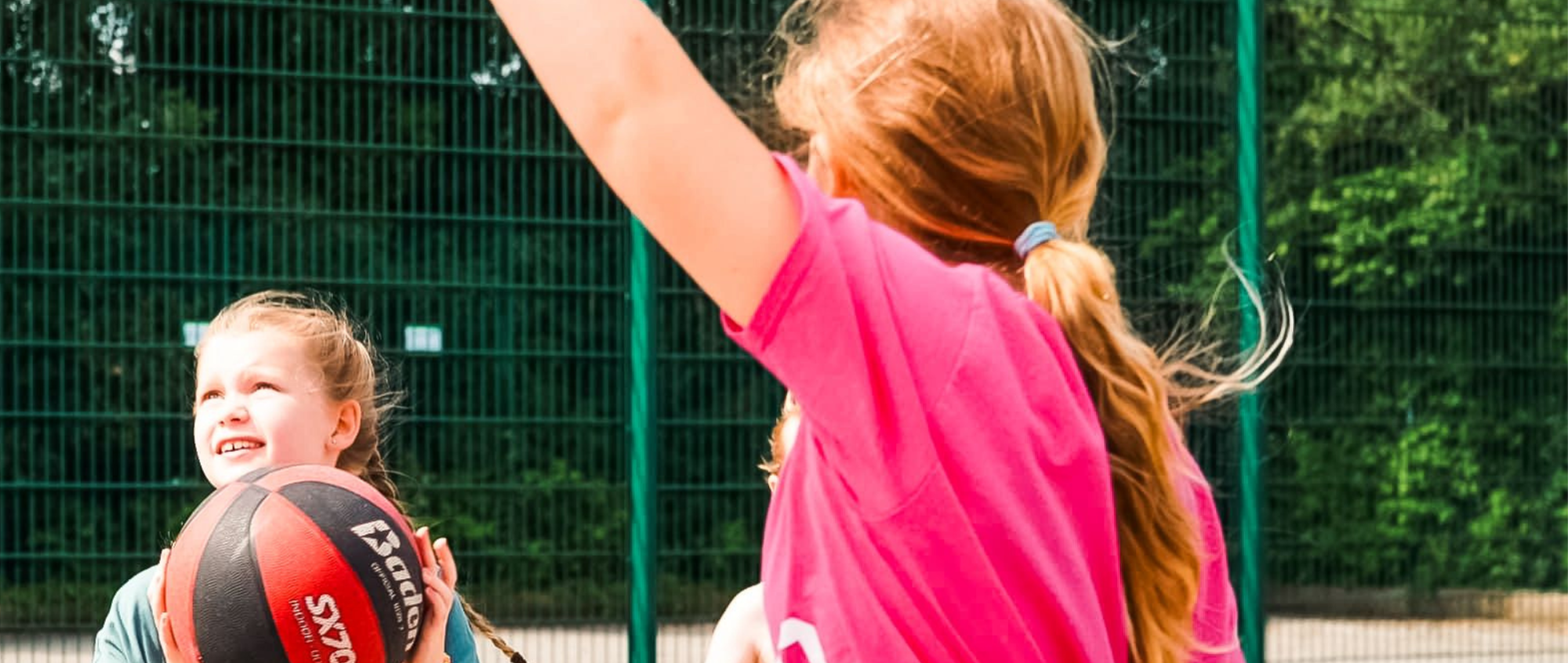 Children playing basketball