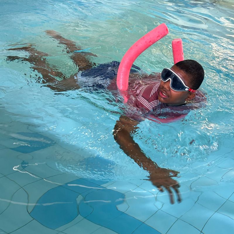 David swimming in a Starfish session