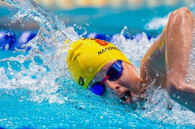 Swimmer in a pool racing