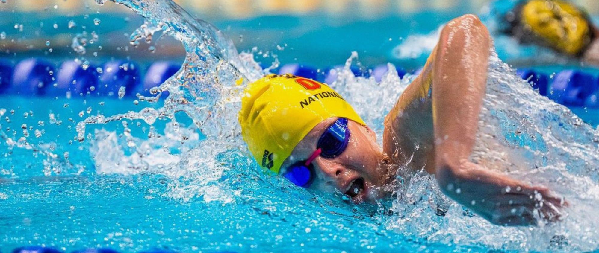 Swimmer in a pool racing