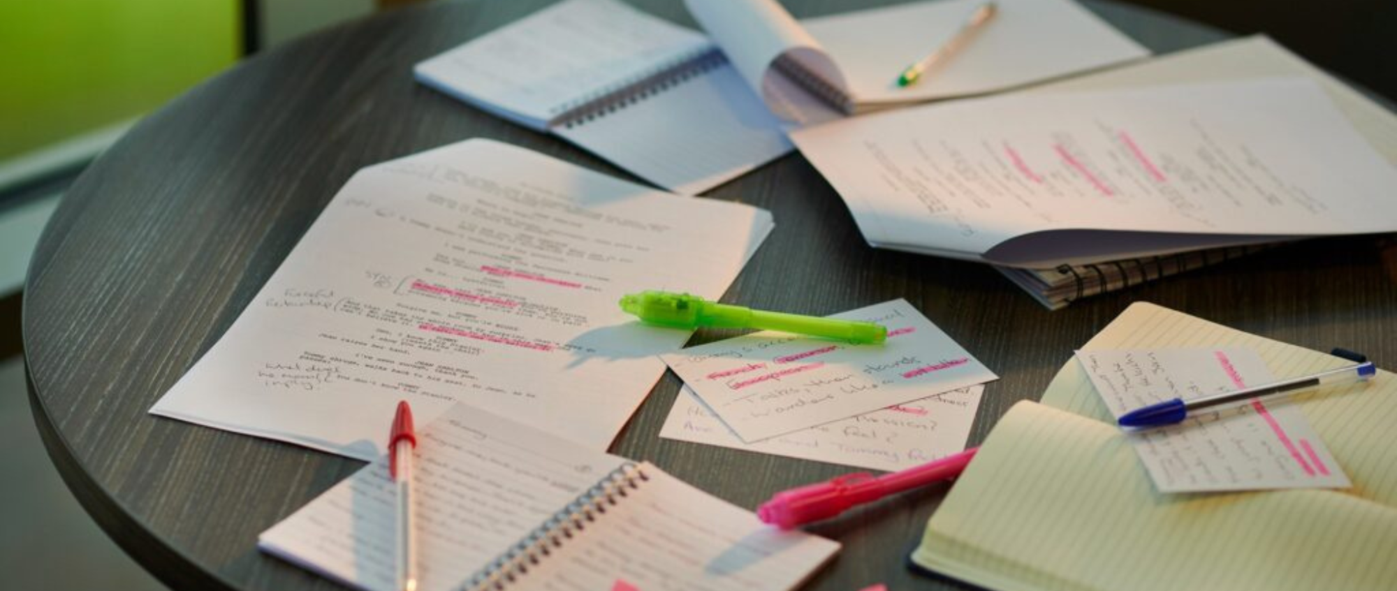 Paper and pens on a table