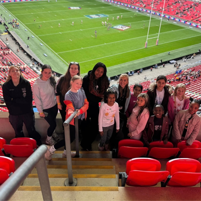Mia and the Young People at Wembley Stadium 