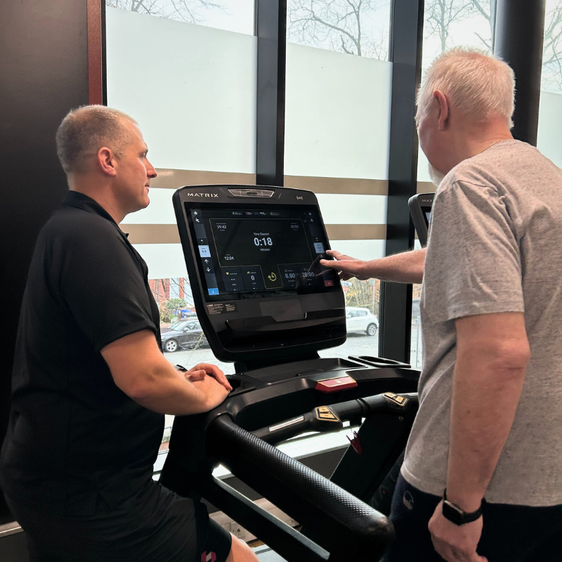 Kevin on a treadmill while Gareth coaches