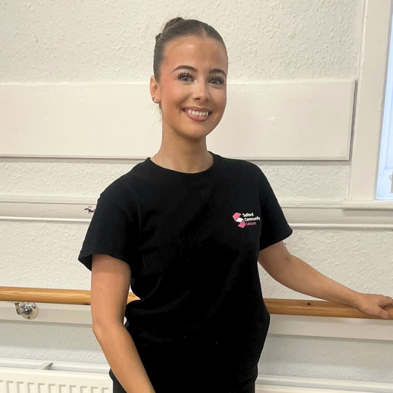 Freya stands at a bar at the SCL Dance School - Guild Hall, Walkden 