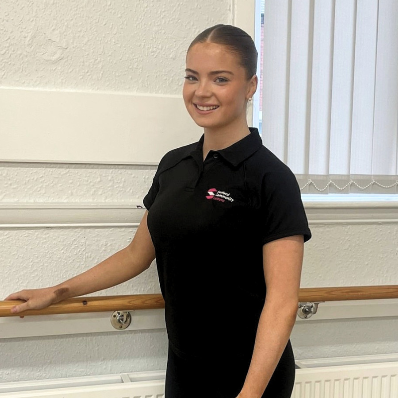 Lucy stands at the bar at the SCL Dance School - Guild Hall, Walkden