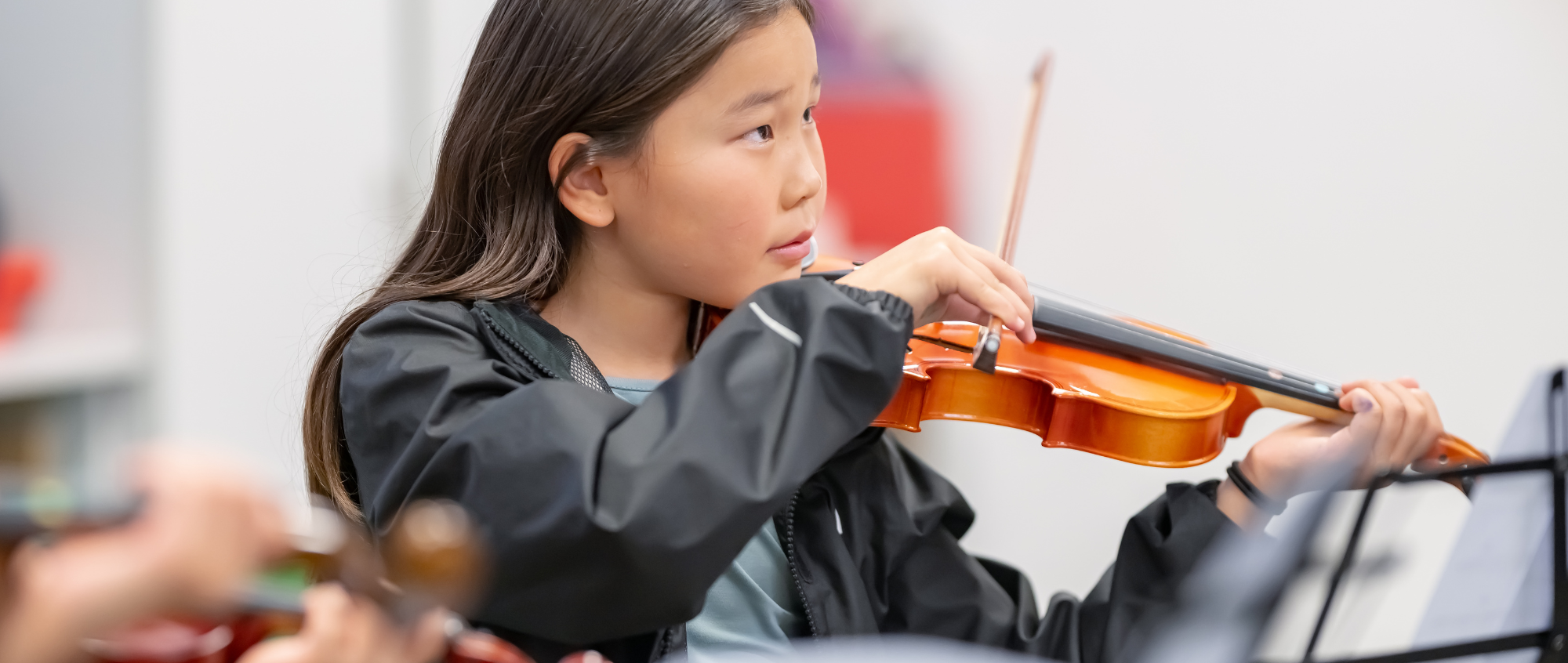 Child playing a violin