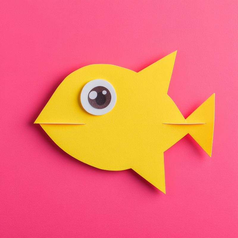 Yellow fish on pink background