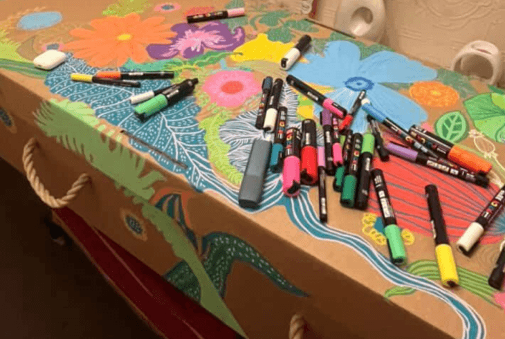 Coffin with colouring materials