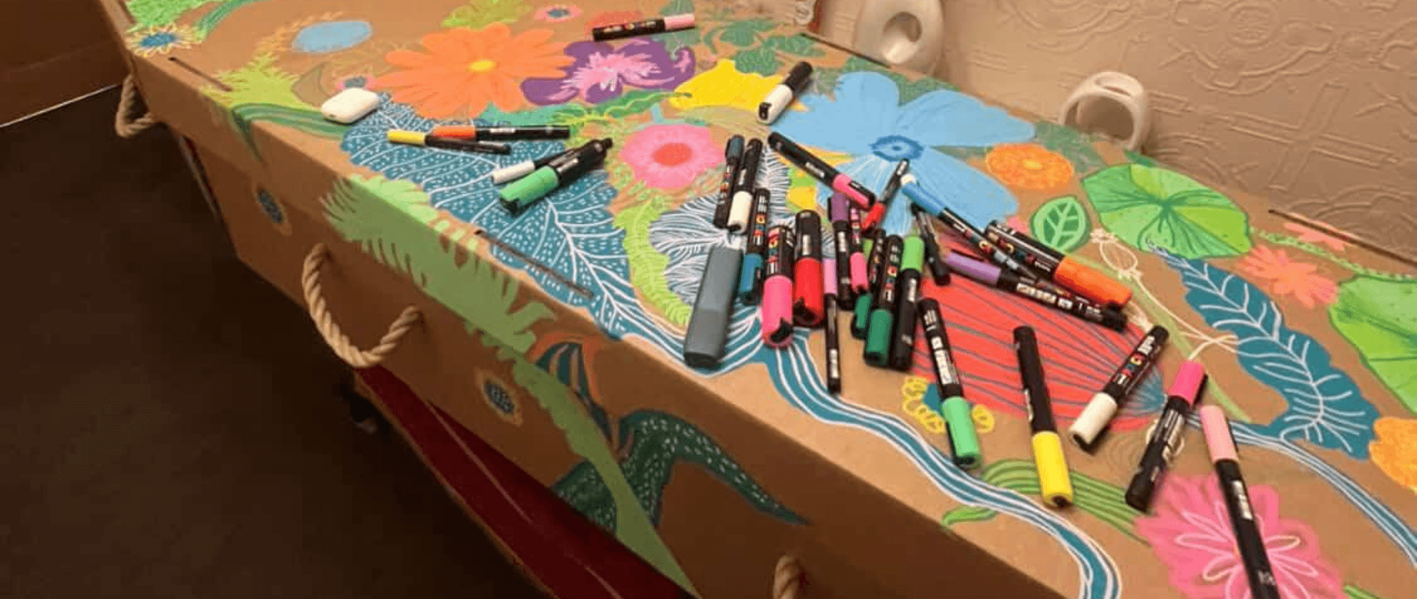 Coffin with colouring materials