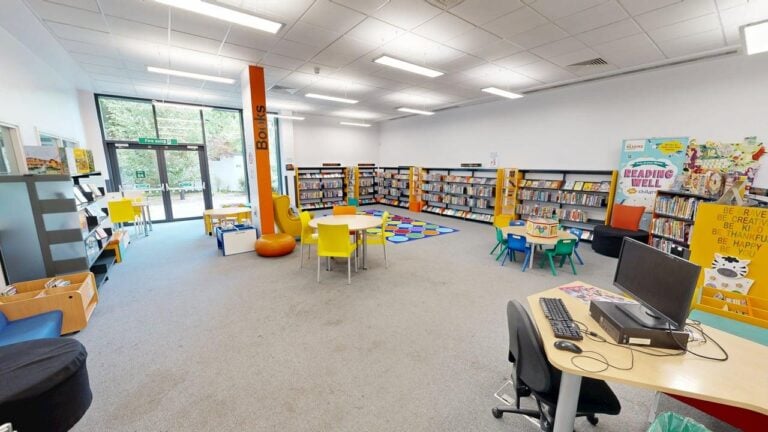 View of the inside of pendleton library showing books and chairs