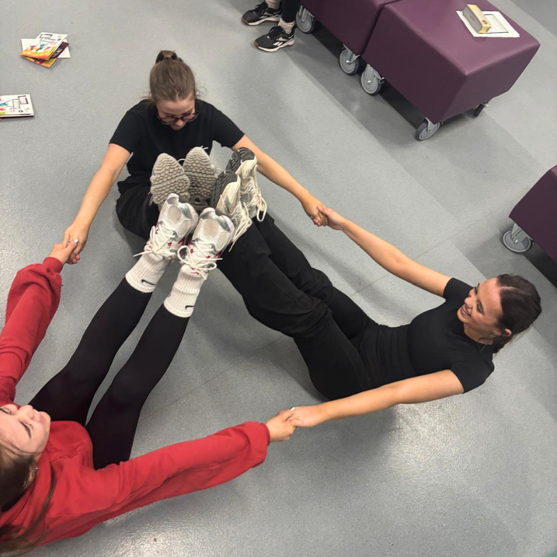 Dancers training at the Den