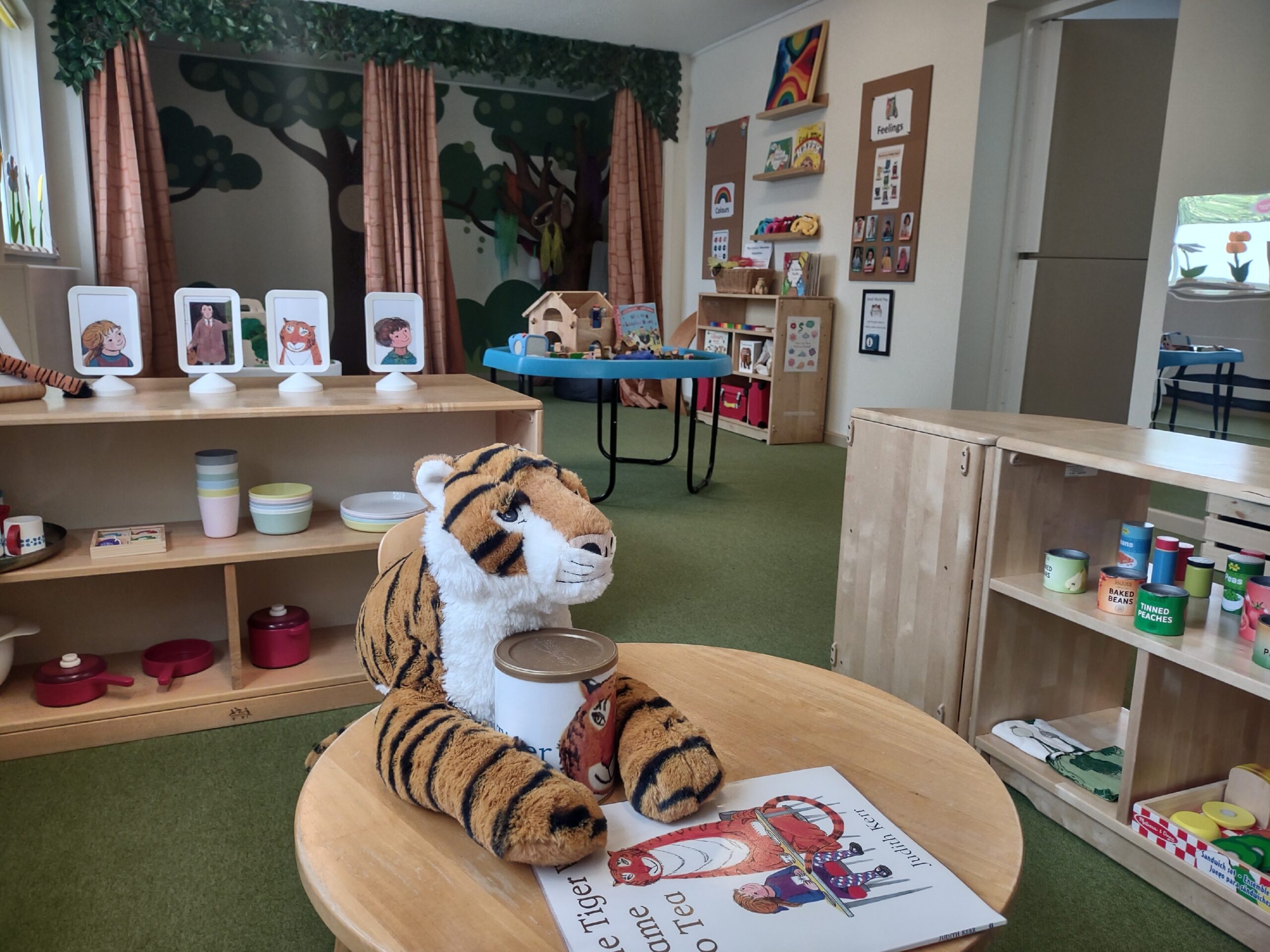 A tiger soft toy sat on a table in the Little Hulton storynook