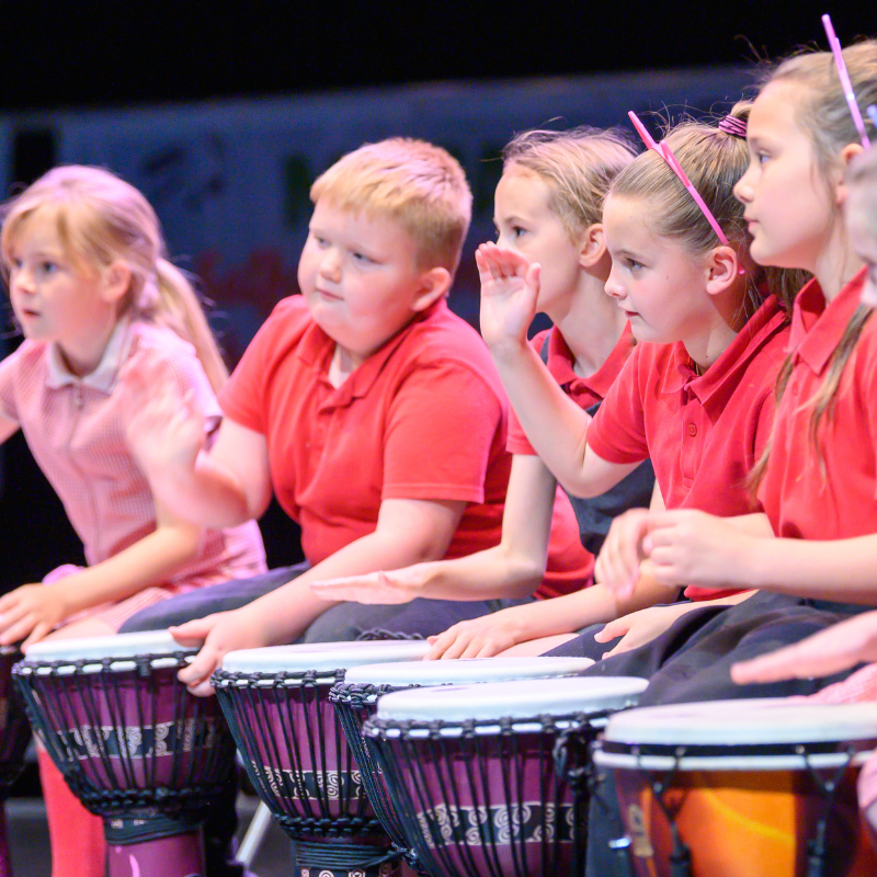 Children playing drums