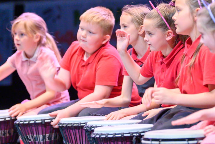 Children playing drums