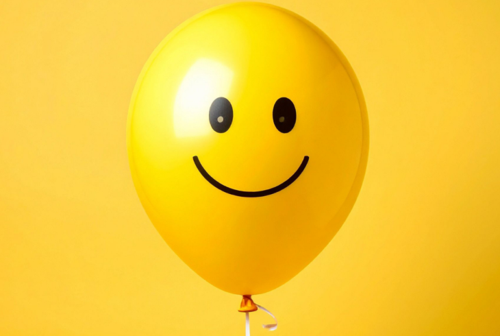 Yellow balloon with smiley face