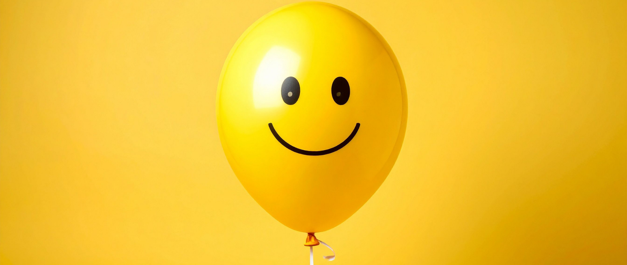 Yellow balloon with smiley face