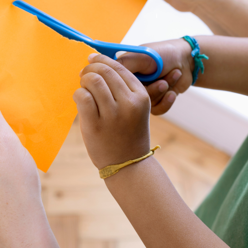 Child cutting paper