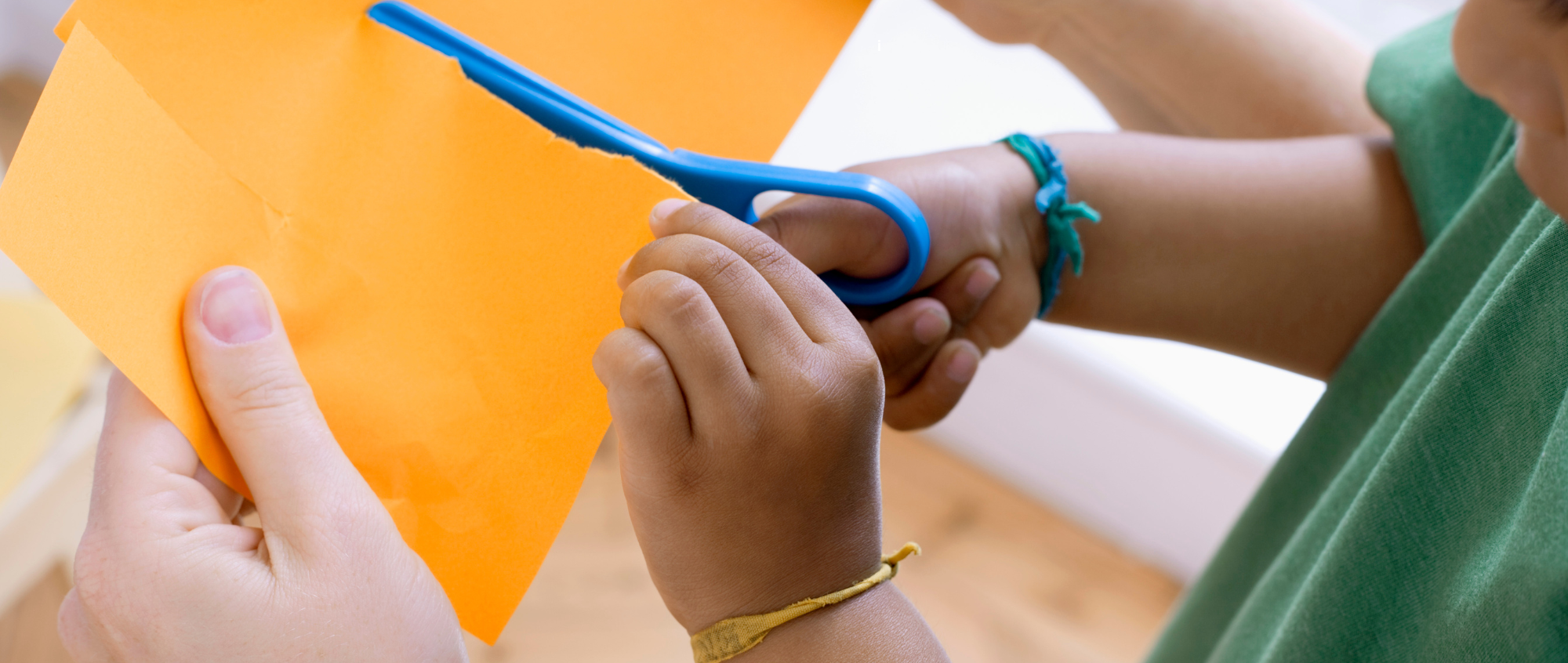 Child cutting paper