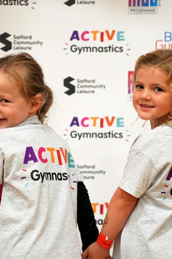 Two girls with Active Gymnastics tops
