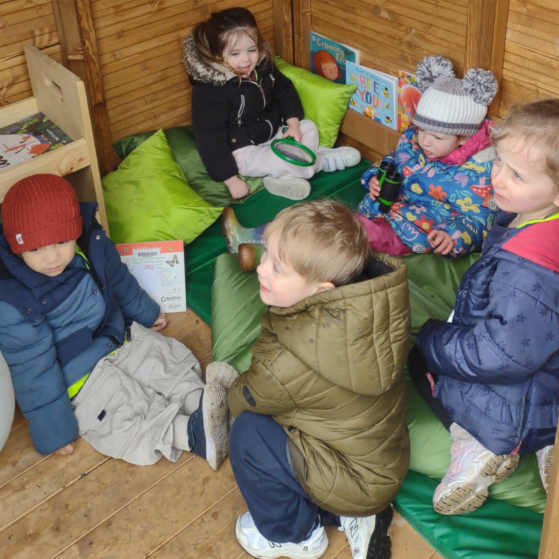 Children in nook in Storygarden