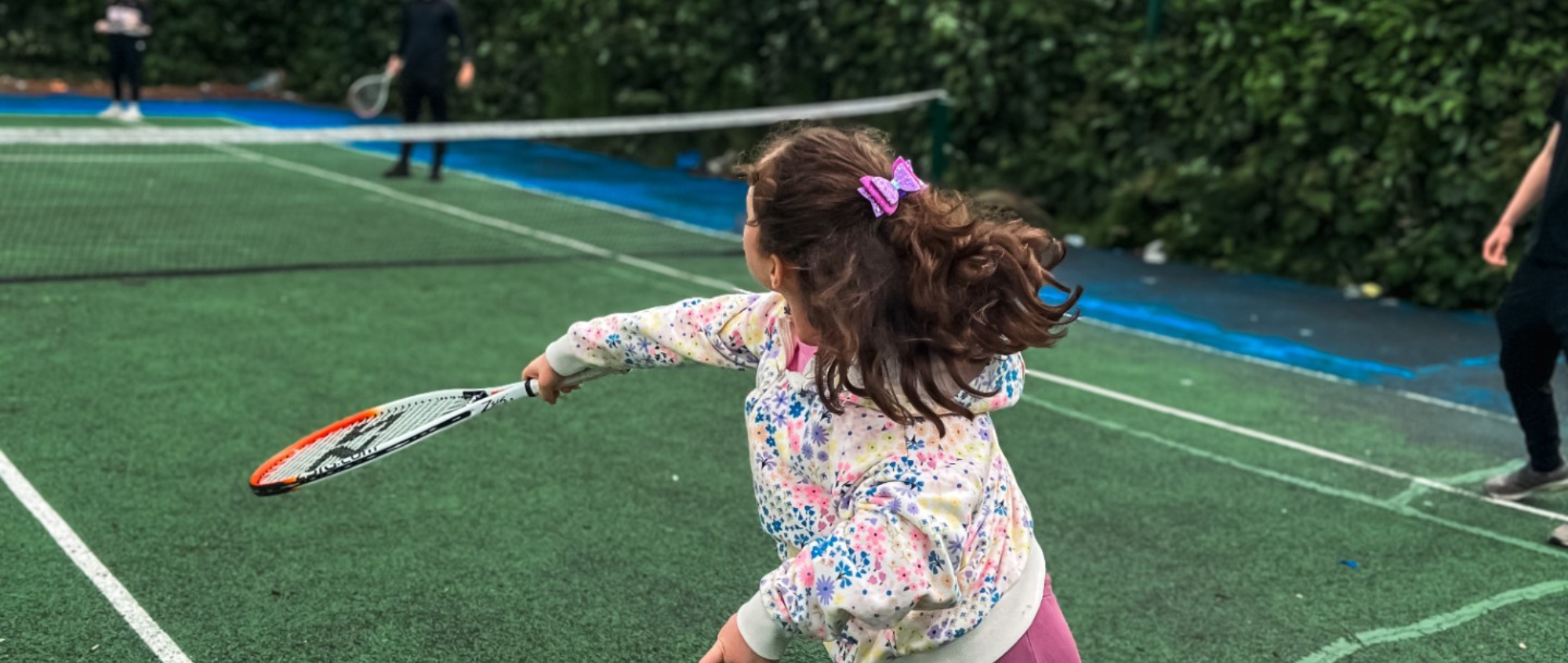 Children playing tennis