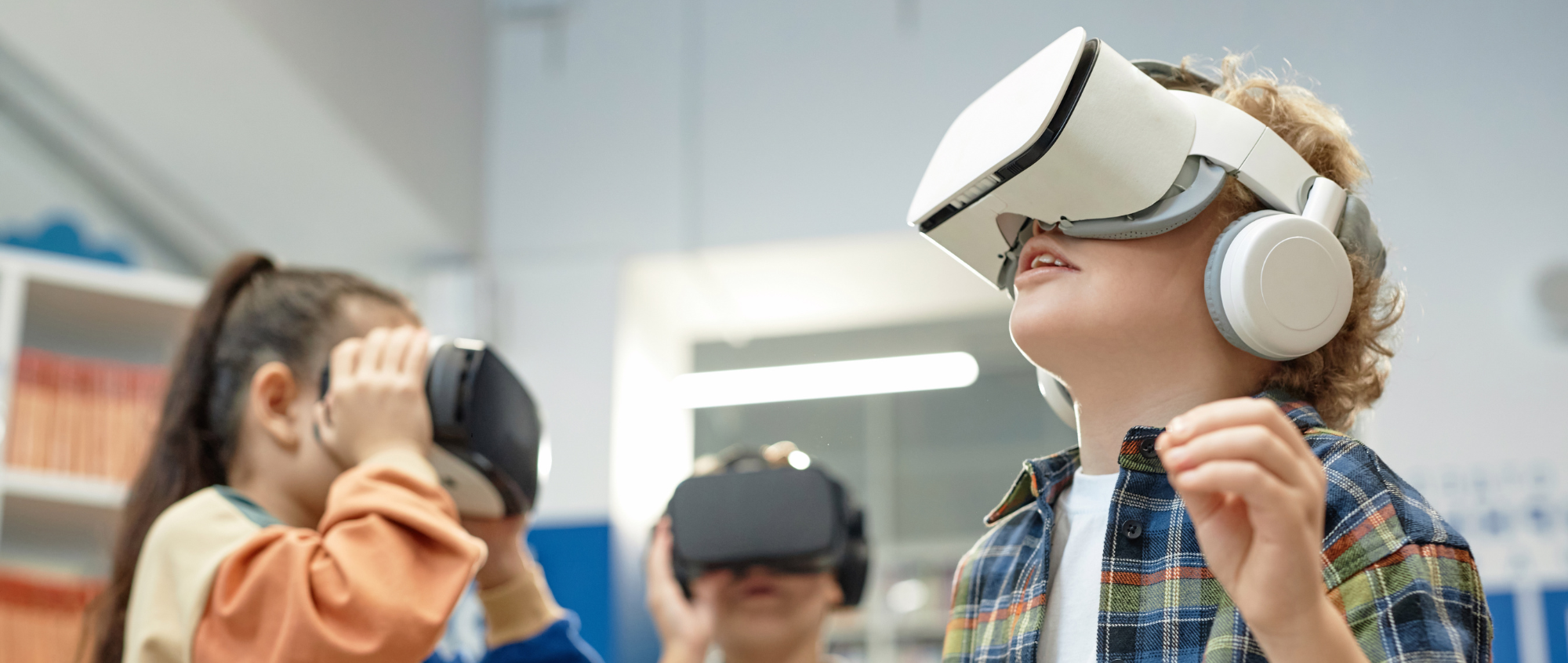 Children with VR headsets