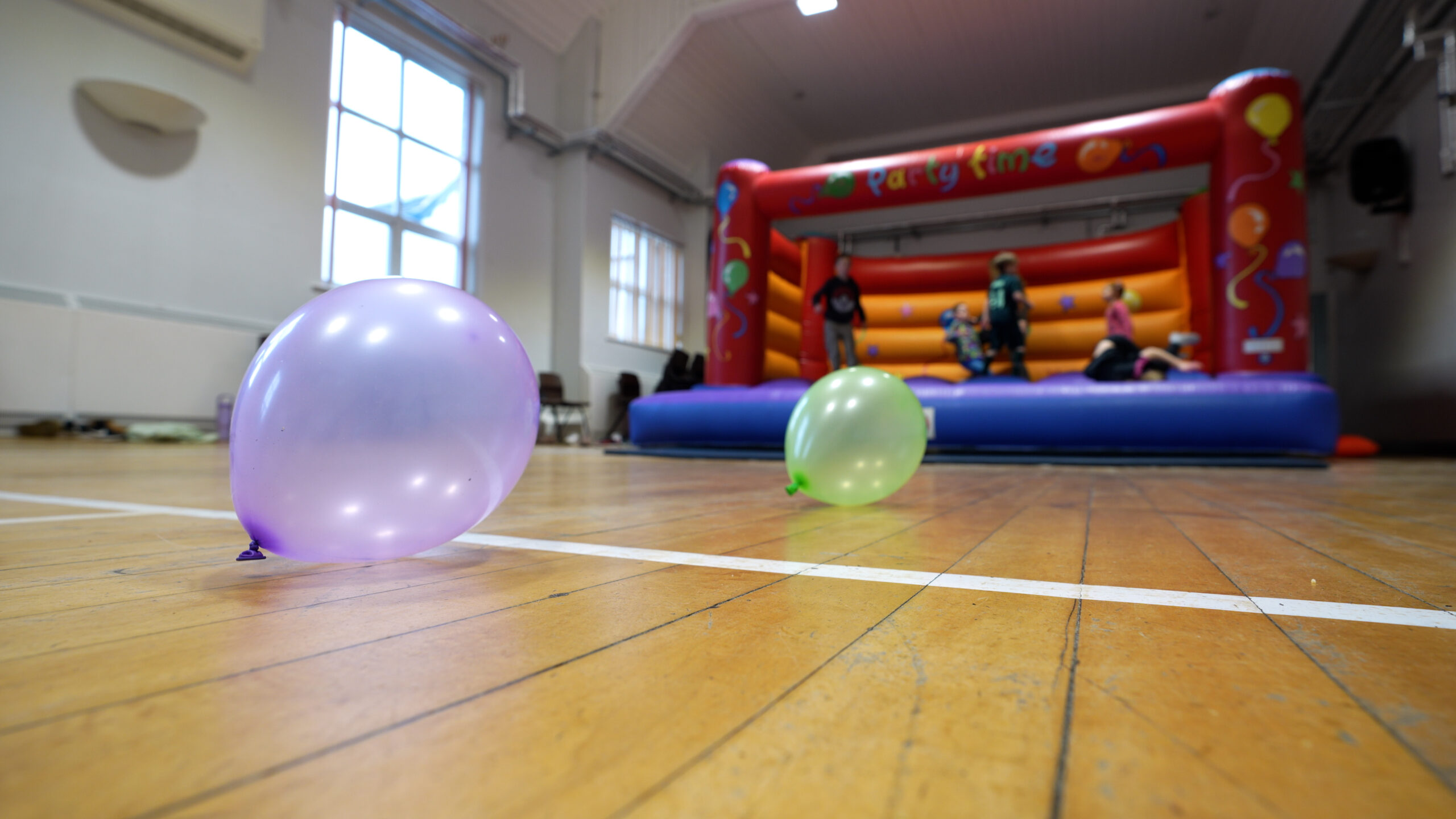 Bouncy Castle set up in a community centre for a bouncy castle party