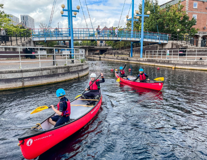 Children in canoes