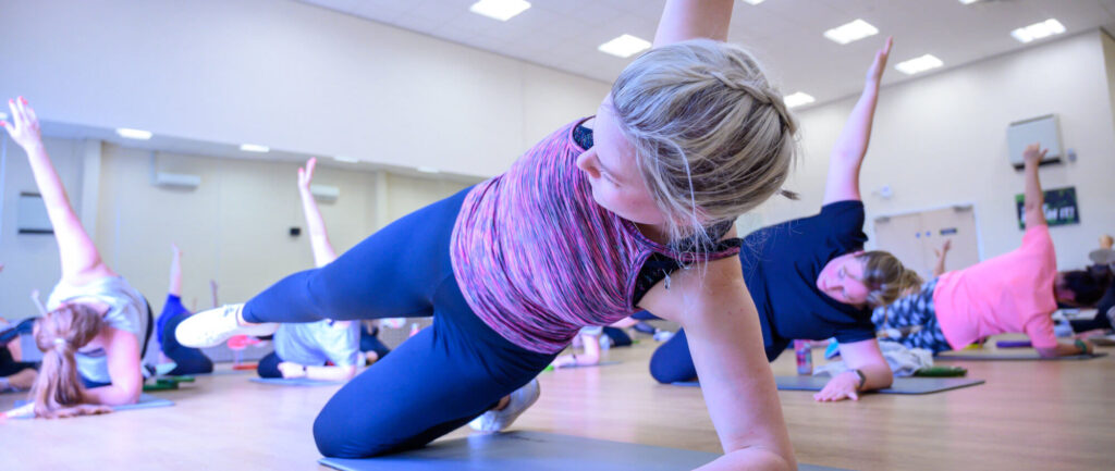 Woman taking part in early morning workout