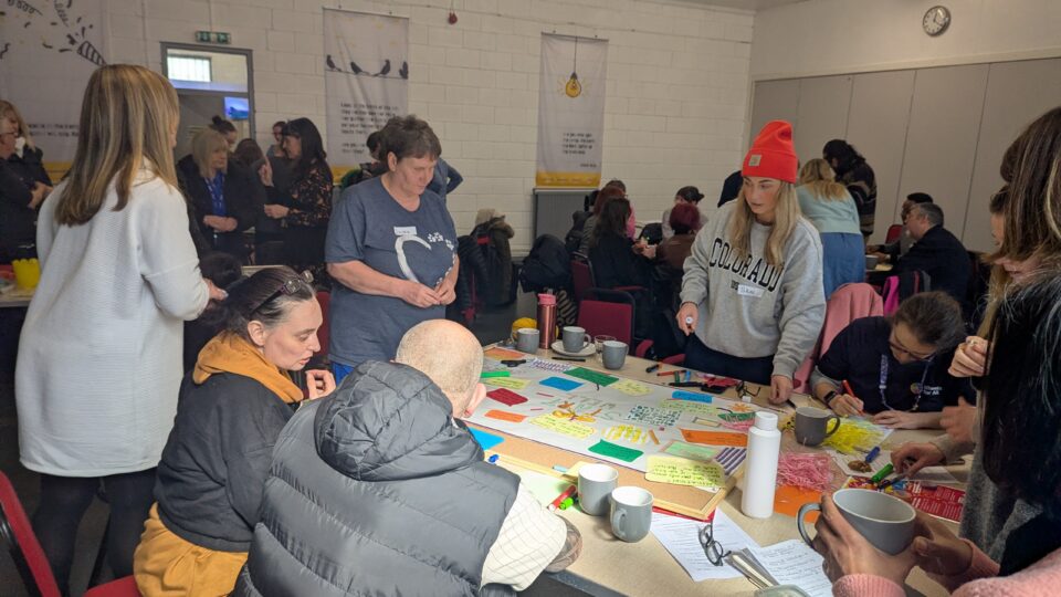 Salford Creative Health Network meeting in Broughton - people joining in a joint creative activity