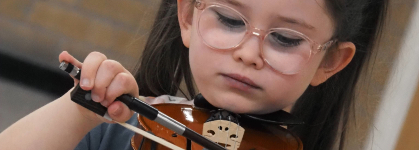 Child playing a violin