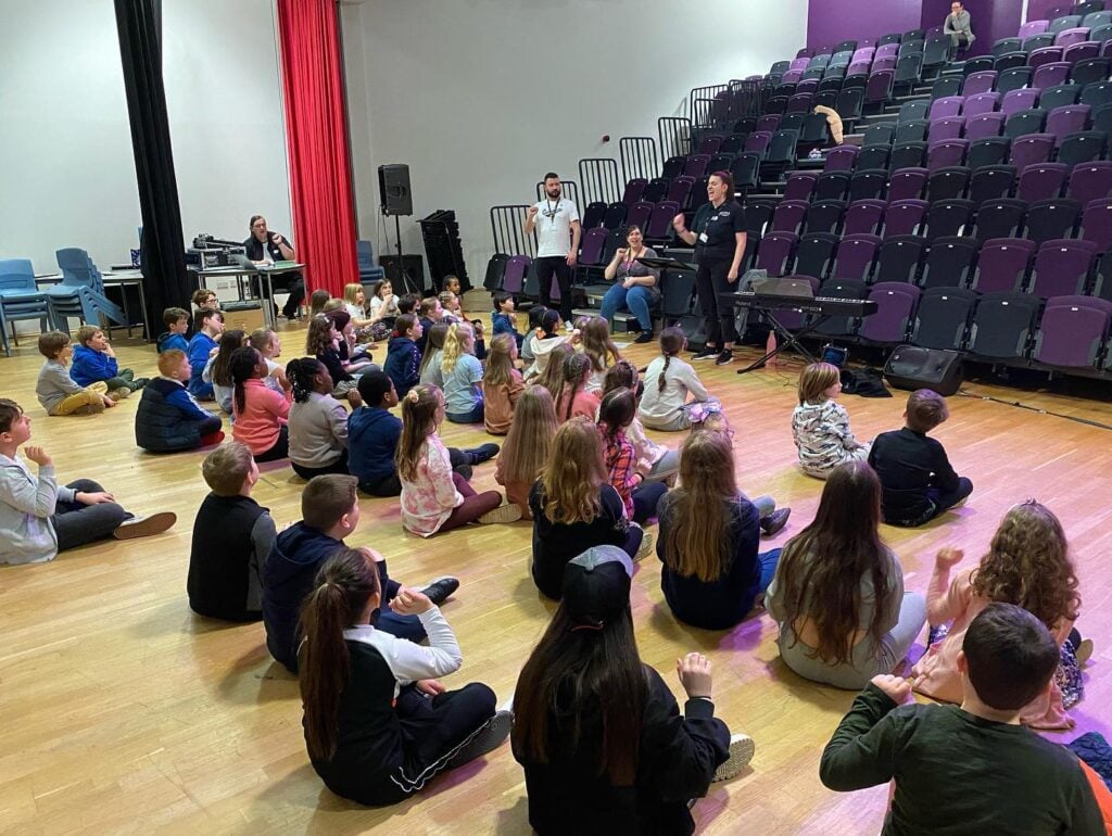 Children sat on floor