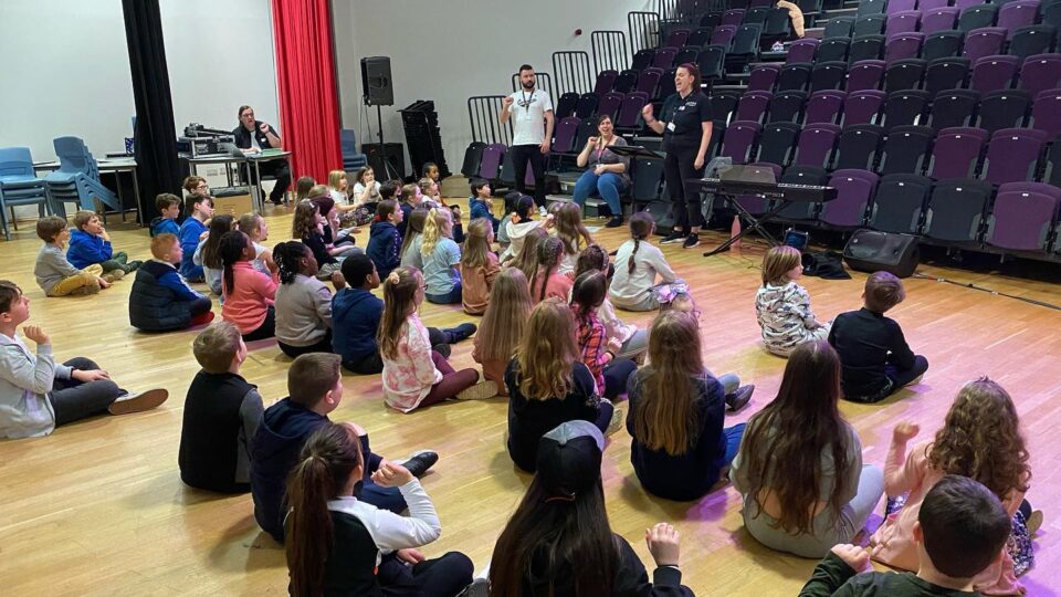 Children sat on floor